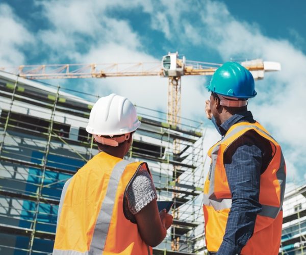 Construction,,Building,Project,And,Engineer,Team,Talking,And,Planning,Vision