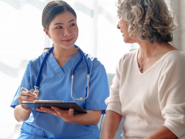 Young,Asian,Caretaker,With,60s,Asia,Elderly,Woman,Consulting,And